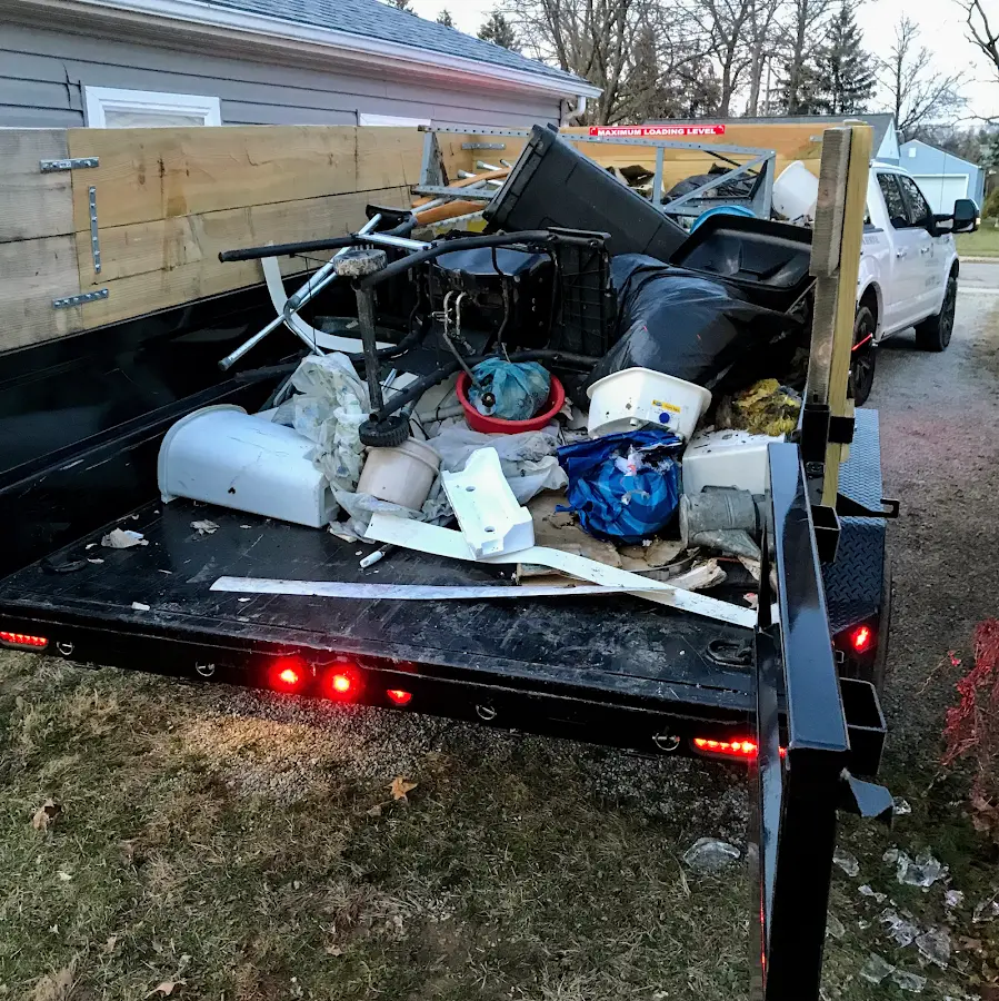 Roll-off dumpster delivered to a residential driveway in Claiborne