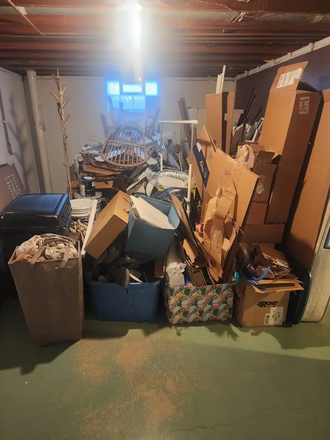 Roll-off dumpster container at job site for 20 Yard Dumpster Rental in Claiborne